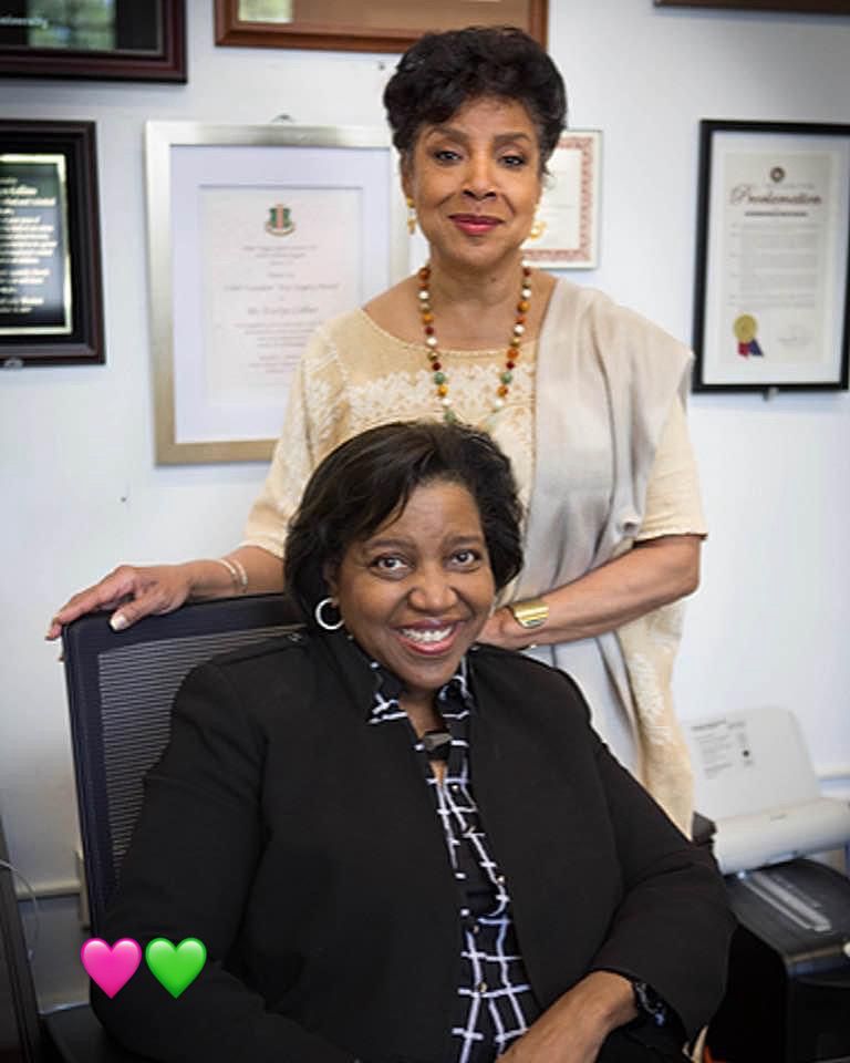 Dr. Evelyn Collins standing with Phylicia Rashad